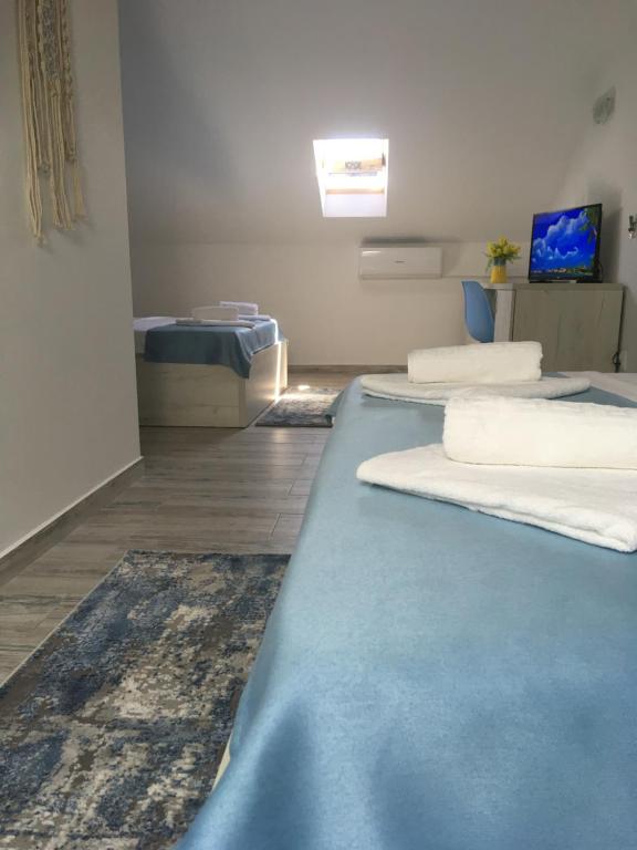 Postel nebo postele na pokoji v ubytování Vila Allure