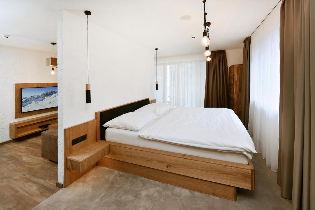Postel nebo postele na pokoji v ubytování APLEND Hotel Ovruč