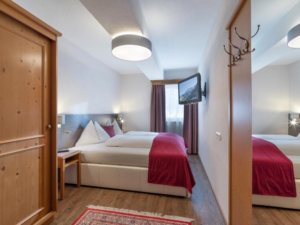 Posteľ alebo postele v izbe v ubytovaní Hotel-Appartement Ferienhof