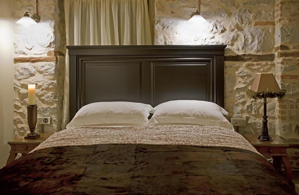 Postel nebo postele na pokoji v ubytování Hotel Doltso