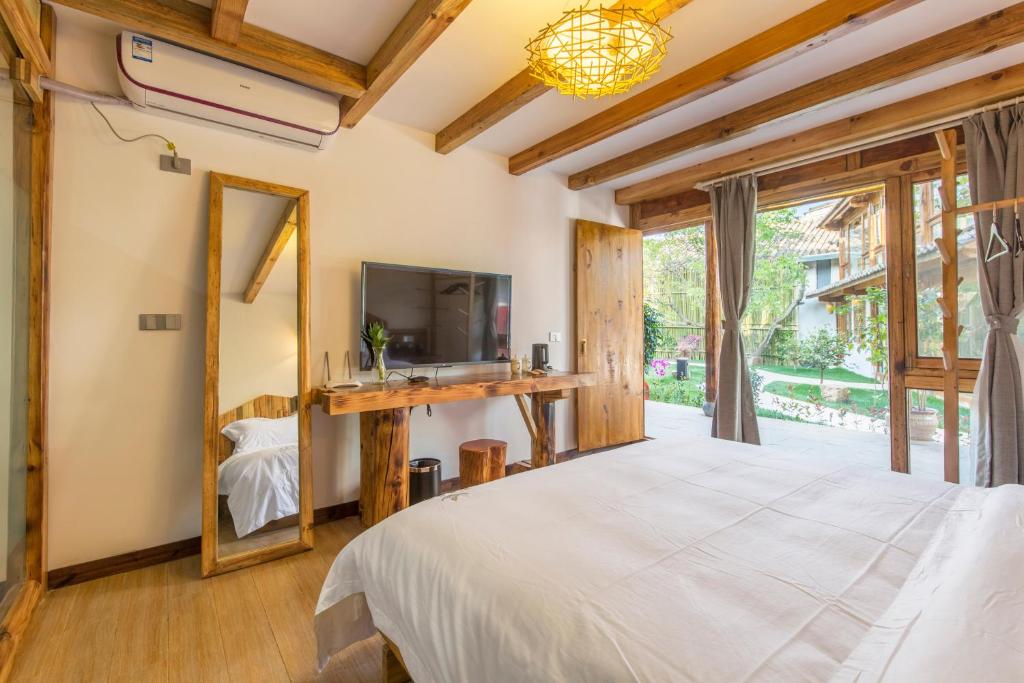 TV a/nebo společenská místnost v ubytování Swallow Nest Guesthouse