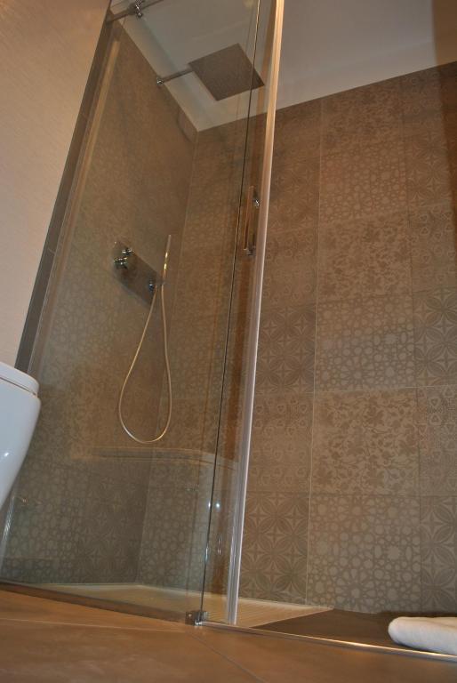 Koupelna v ubytování Salina Hotel