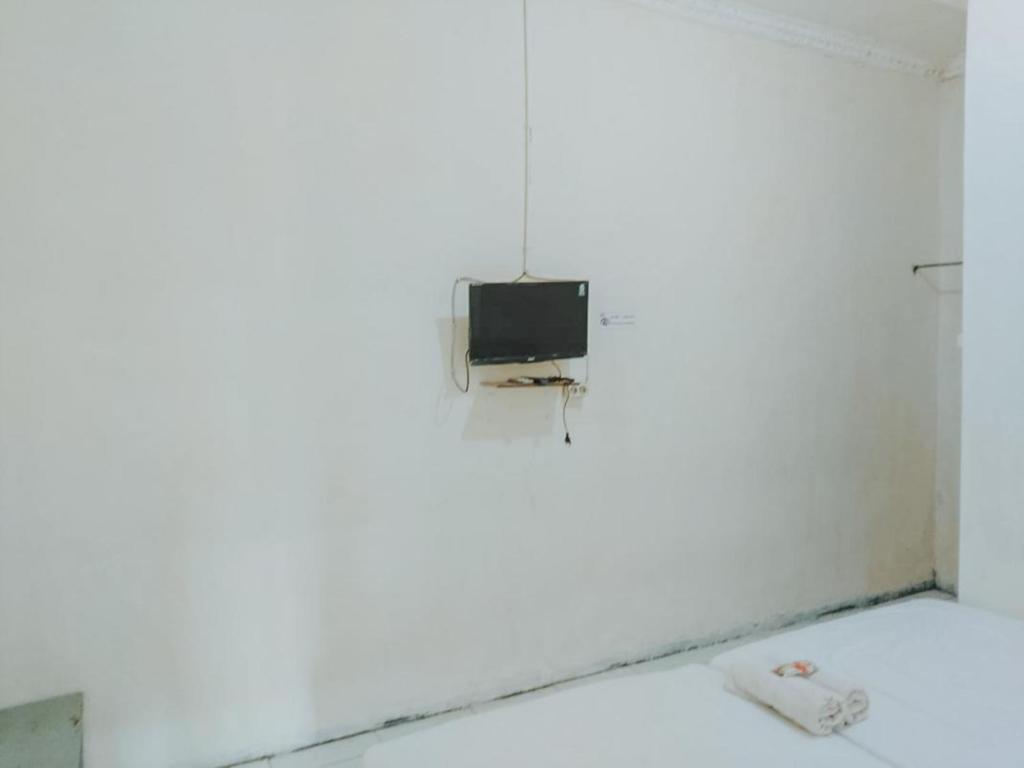 De Luck Homestay near Alun Alun Sidoarjo Mitra RedDoorz - Tweelingzaal