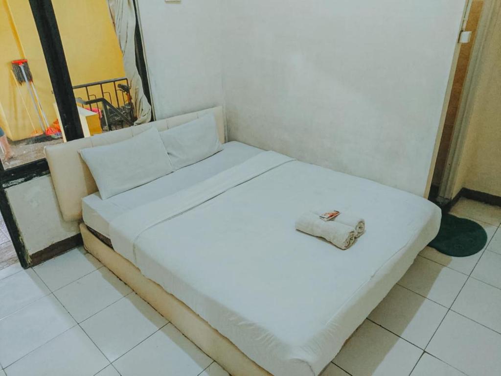 De Luck Homestay near Alun Alun Sidoarjo Mitra RedDoorz - Economy Tweepersoonskamer