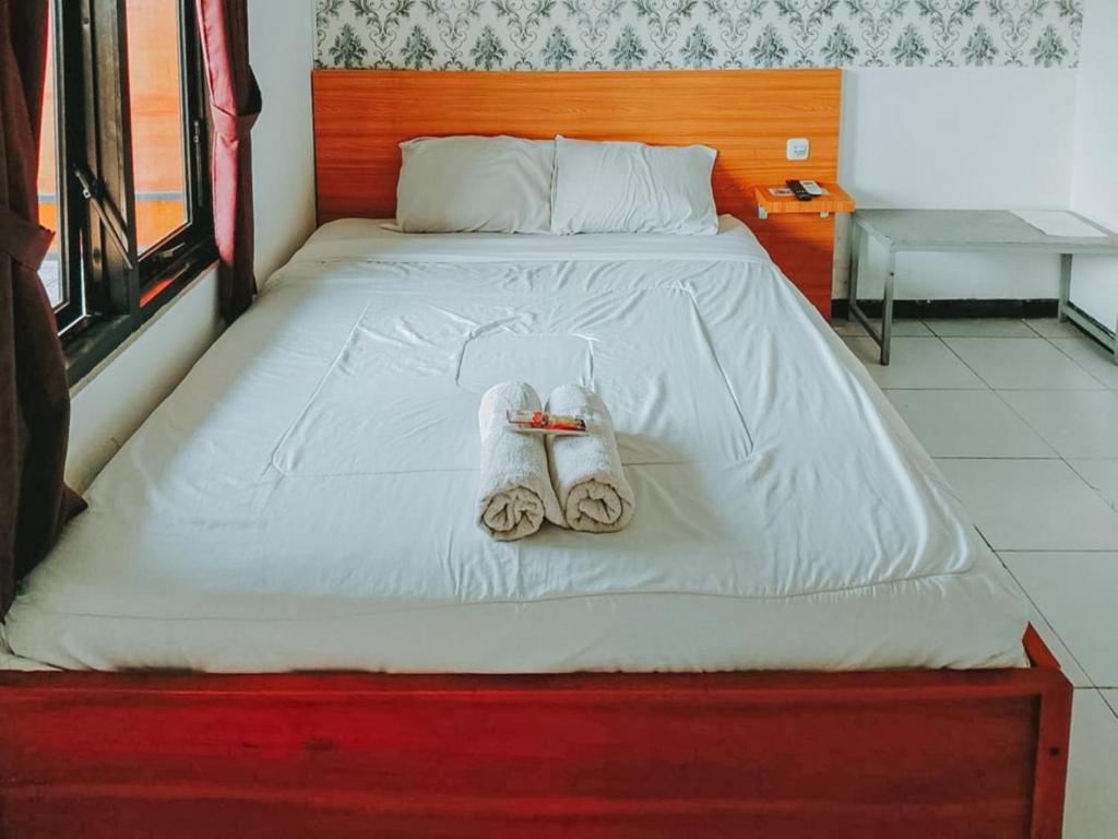 De Luck Homestay near Alun Alun Sidoarjo Mitra RedDoorz - Luxe Tweepersoonskamer