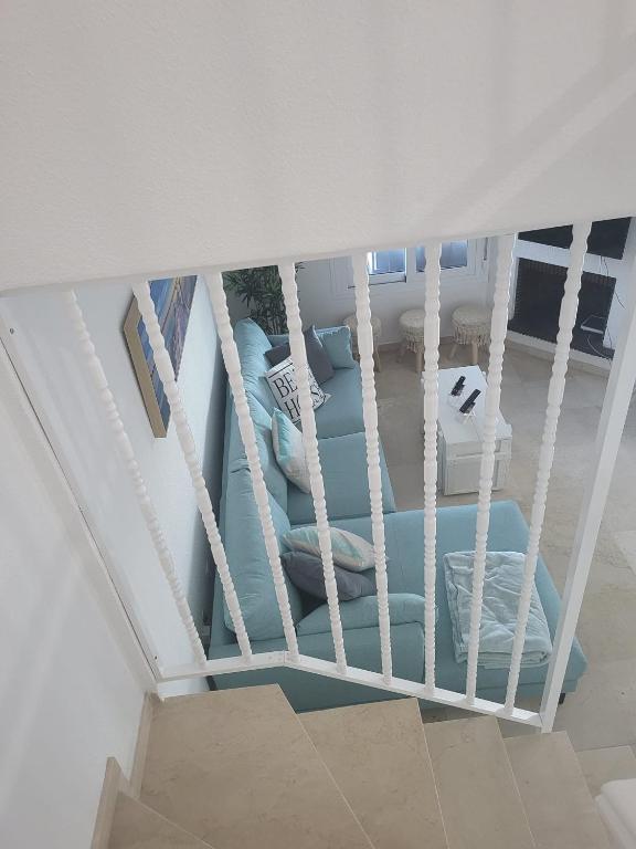 Кровать или кровати в номере Casa de Almano - Torremolinos direct on beach