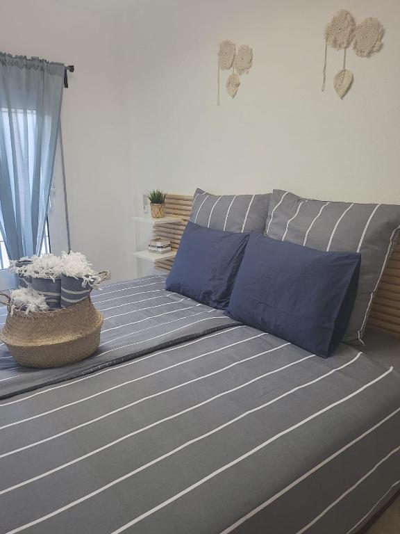 Кровать или кровати в номере Casa de Almano - Torremolinos direct on beach