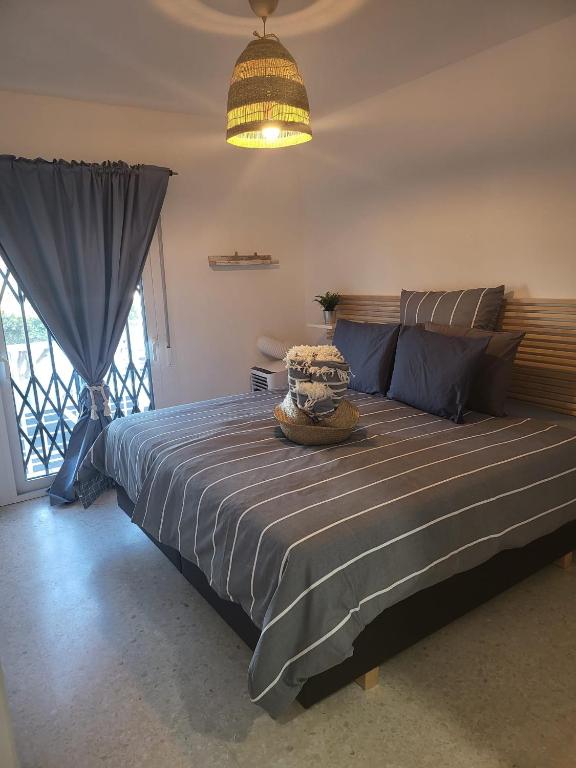 Кровать или кровати в номере Casa de Almano - Torremolinos direct on beach
