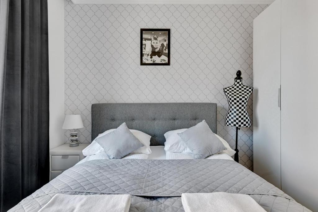 Posteľ alebo postele v izbe v ubytovaní Grand Apartments - Brabank Apartments