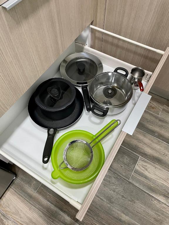 Kuchyň nebo kuchyňský kout v ubytování Cozy Apartment Metaxourgeio greendom