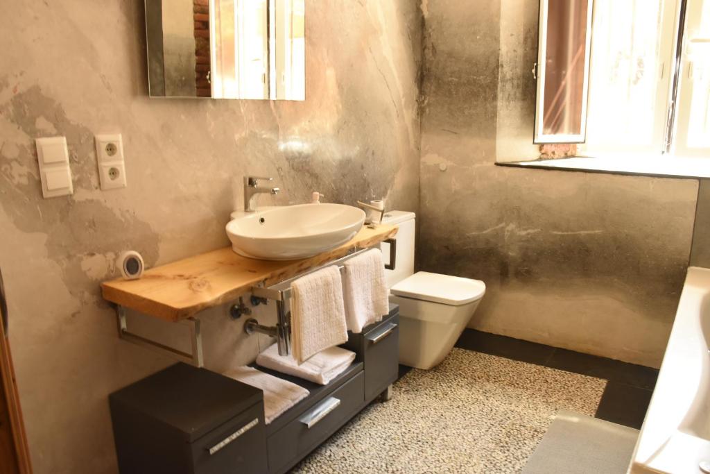 Koupelna v ubytování Apartamentos Tierra y Arte