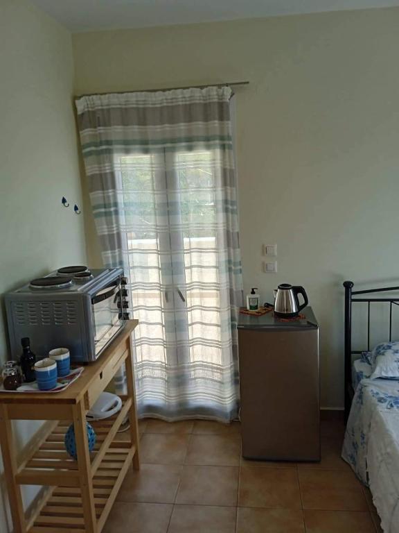 Kuchyň nebo kuchyňský kout v ubytování Leros 'Sundown' Guest house