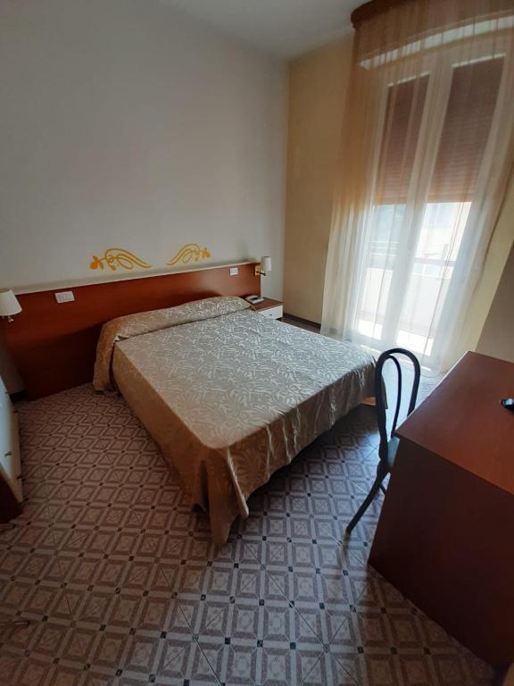 Postel nebo postele na pokoji v ubytování Mio Hotel Firenze