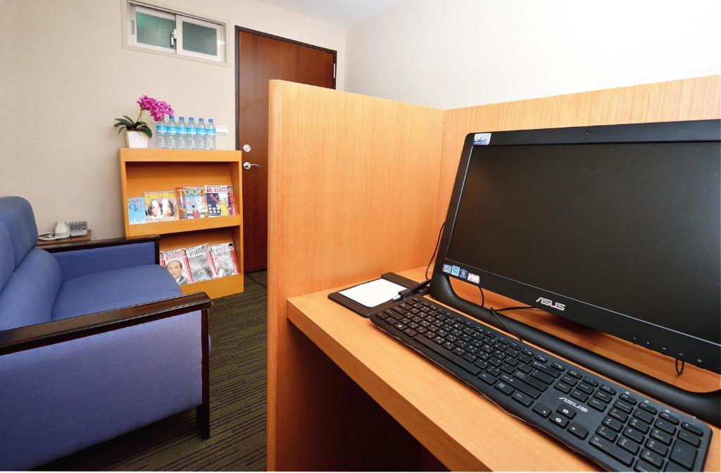 TV a/nebo společenská místnost v ubytování Fuward Hotel Tainan
