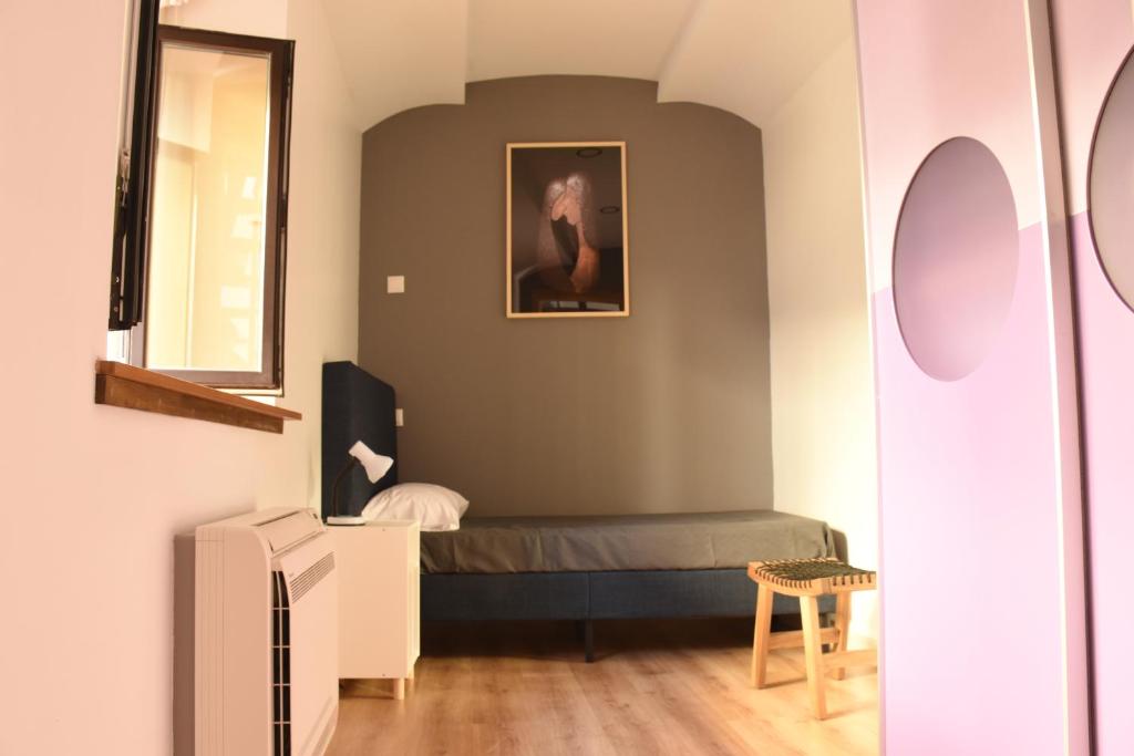 Postel nebo postele na pokoji v ubytování Apartamentos Tierra y Arte