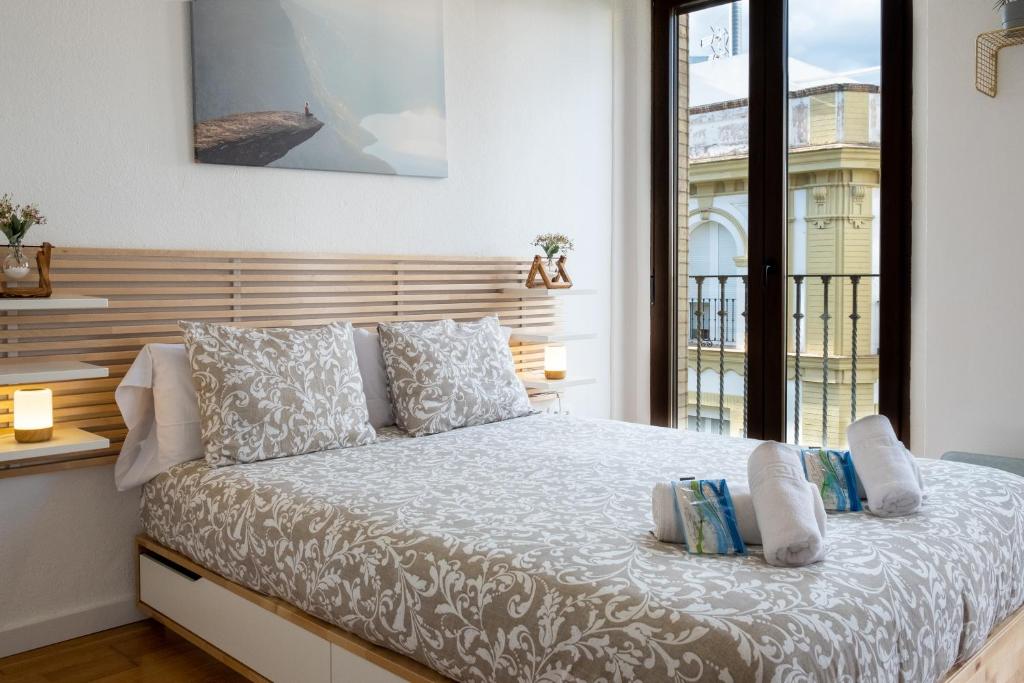 Кровать или кровати в номере Vista Catedral