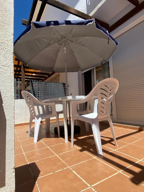 A patio or other outdoor area at Adosados Palm Beach Altamar