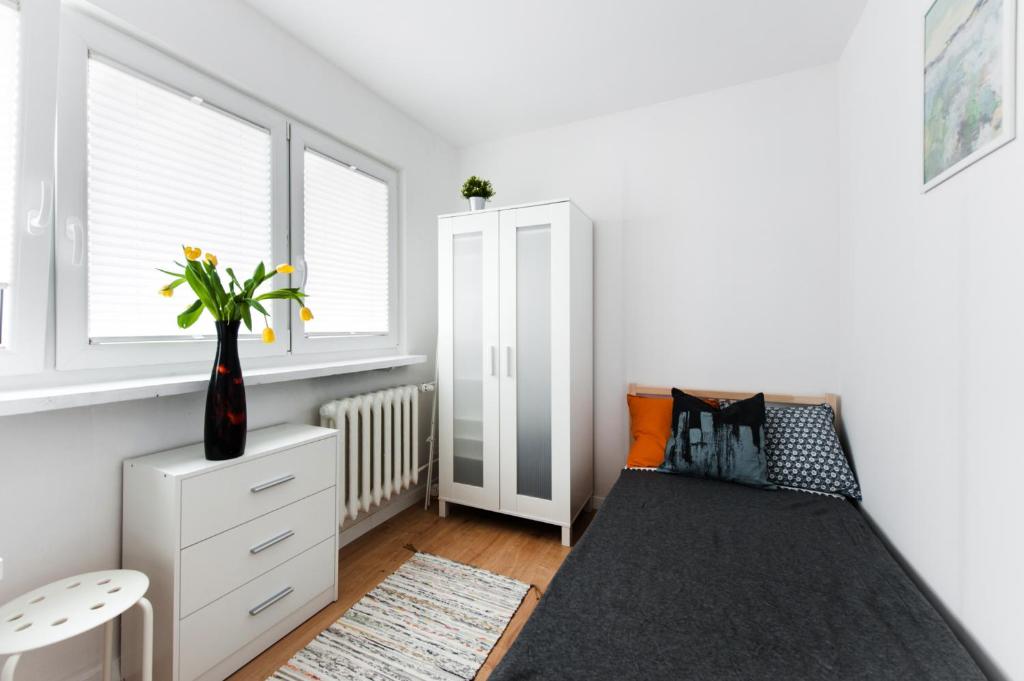 Posteľ alebo postele v izbe v ubytovaní ROOM, Kochanowskiego 32