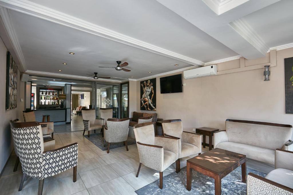 TV a/nebo společenská místnost v ubytování Regent Select Hotel