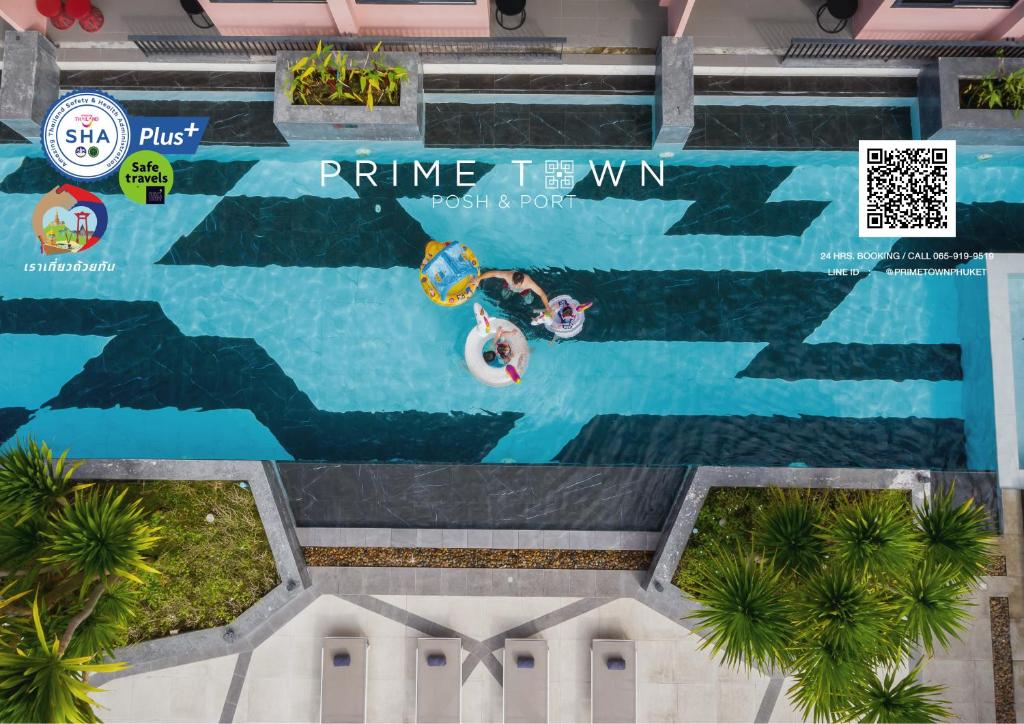 an overhead view of a swimming pool at a resort at PRIME TOWN - Posh & Port Hotel PHUKET in Phuket Town