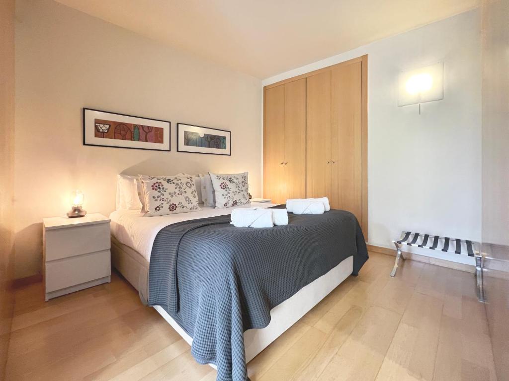 Postel nebo postele na pokoji v ubytování Stay U-nique Apartments Venecuela