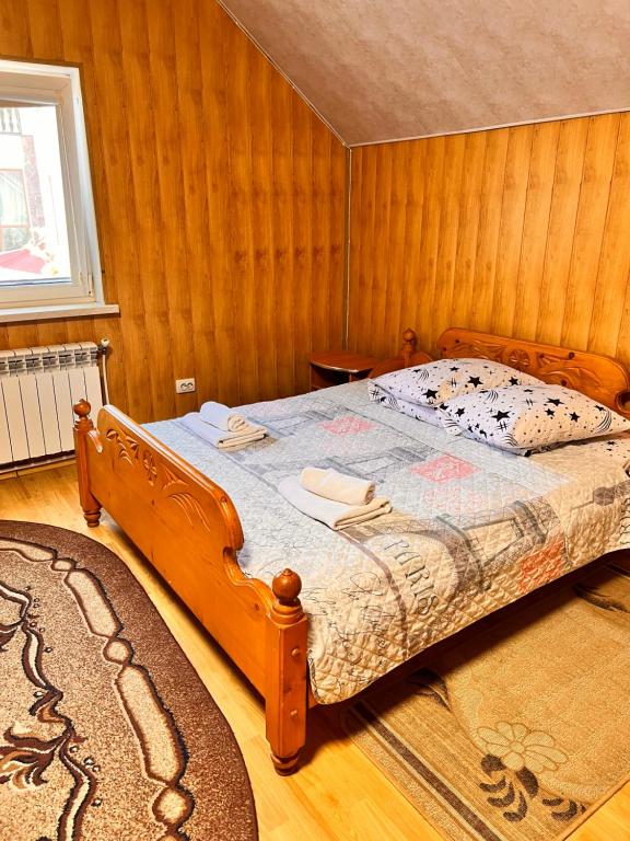 Postel nebo postele na pokoji v ubytování Pid Yavorom