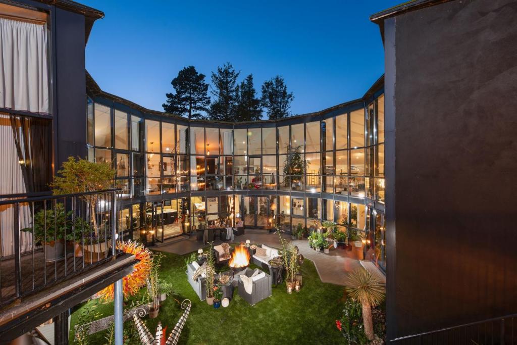 an indoor courtyard of a building at night at Woolbrook Reservoir, Sidmouth in Sidmouth