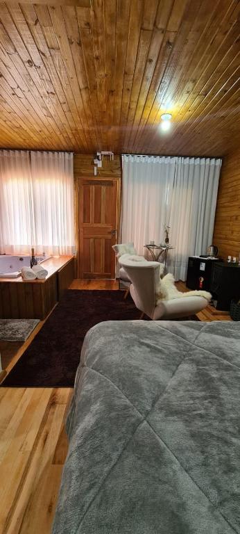 Postel nebo postele na pokoji v ubytování Hospedaria Kayser Haus