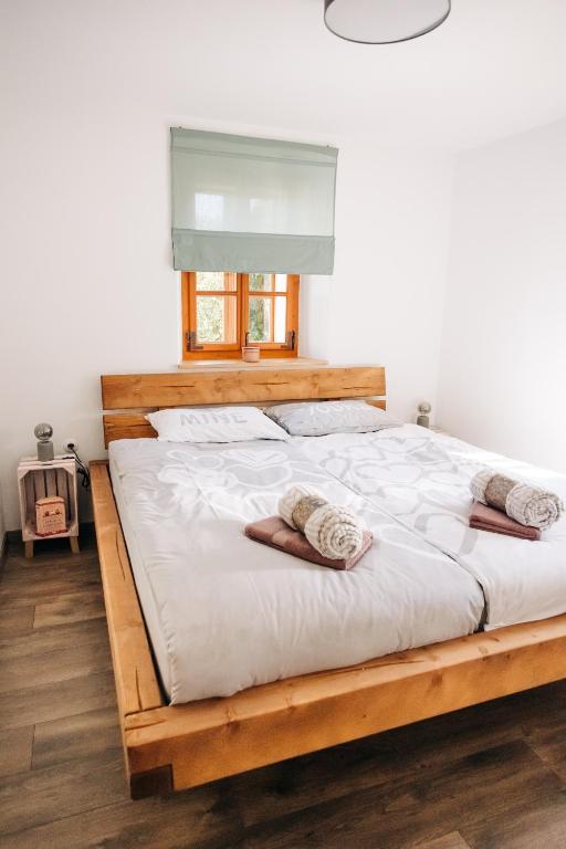 Postel nebo postele na pokoji v ubytování Štekner house Apartma