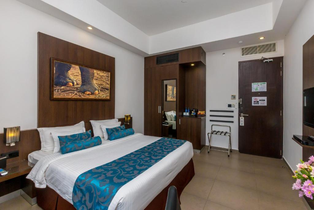 Postel nebo postele na pokoji v ubytování Best Western Elyon Colombo