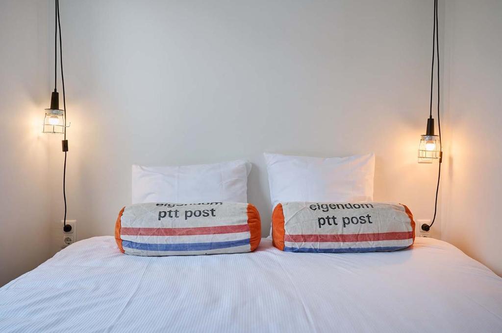Postel nebo postele na pokoji v ubytování Hello I'm Local - Boutique Hostel