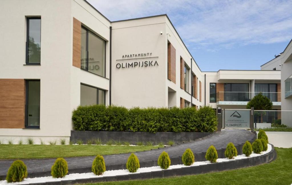 a rendering of the entrance to an apartment building at Apartament Olimpijska przy jeziorze Ukiel in Olsztyn