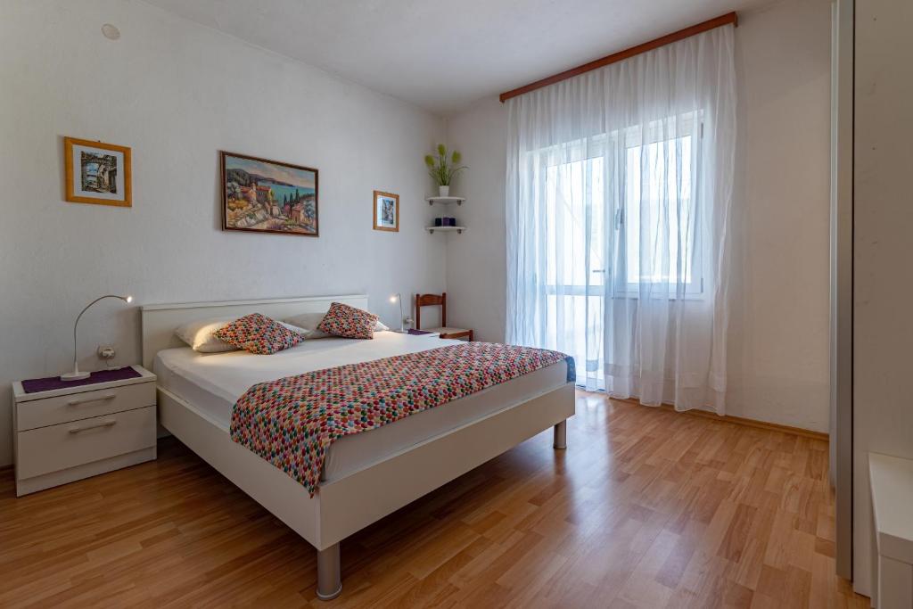 Posteľ alebo postele v izbe v ubytovaní Apartments with parking spaces Jelsa, Hvar - 134