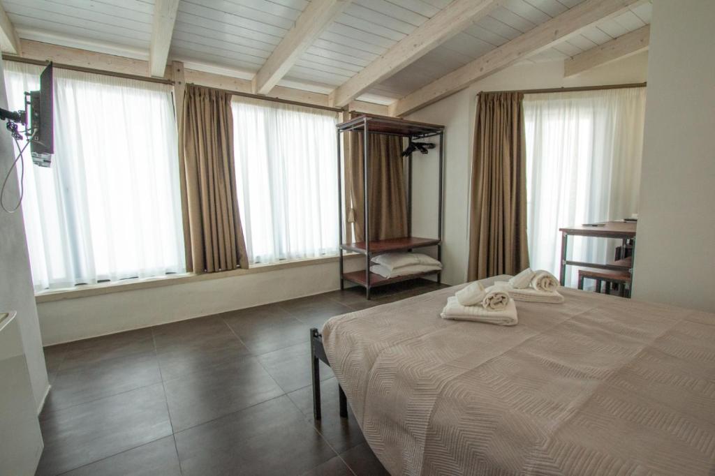 Postel nebo postele na pokoji v ubytování GH Dimora Sant'Anna