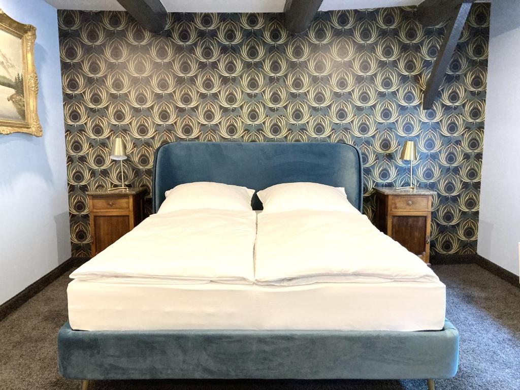 Postel nebo postele na pokoji v ubytování Agli Hotel