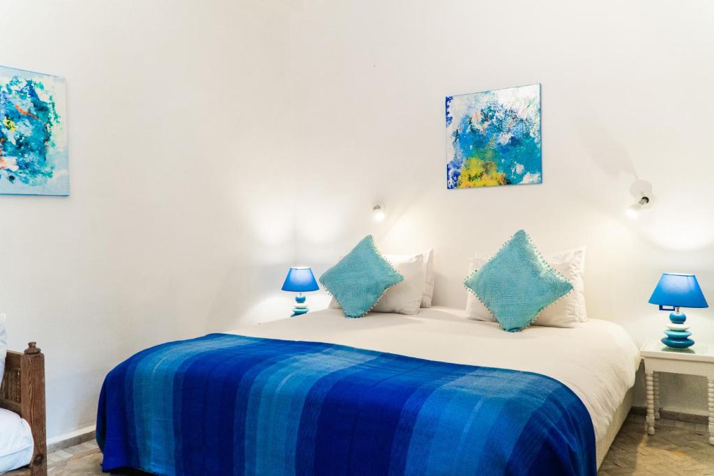 Postel nebo postele na pokoji v ubytování Dar Liouba Hotel