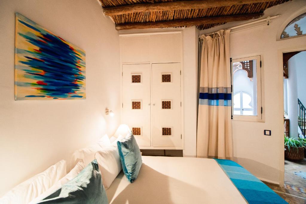Postel nebo postele na pokoji v ubytování Dar Liouba Hotel