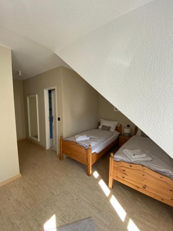 Postel nebo postele na pokoji v ubytování Das Anni's