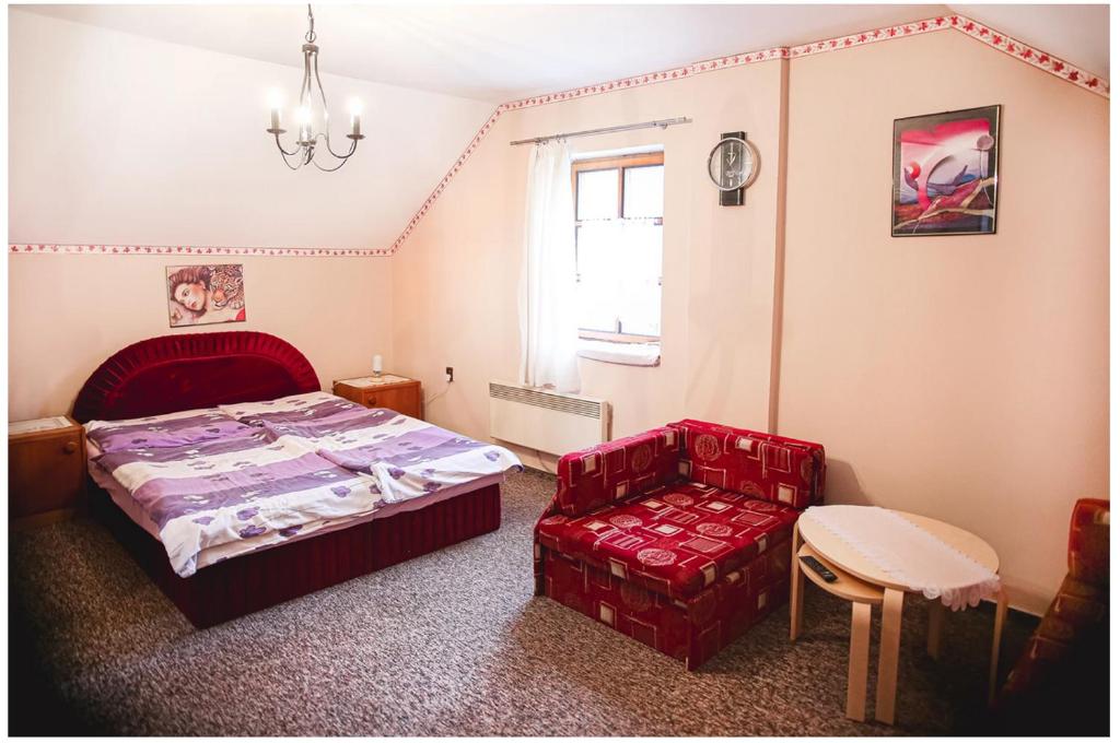 Postel nebo postele na pokoji v ubytování Stáj Newport
