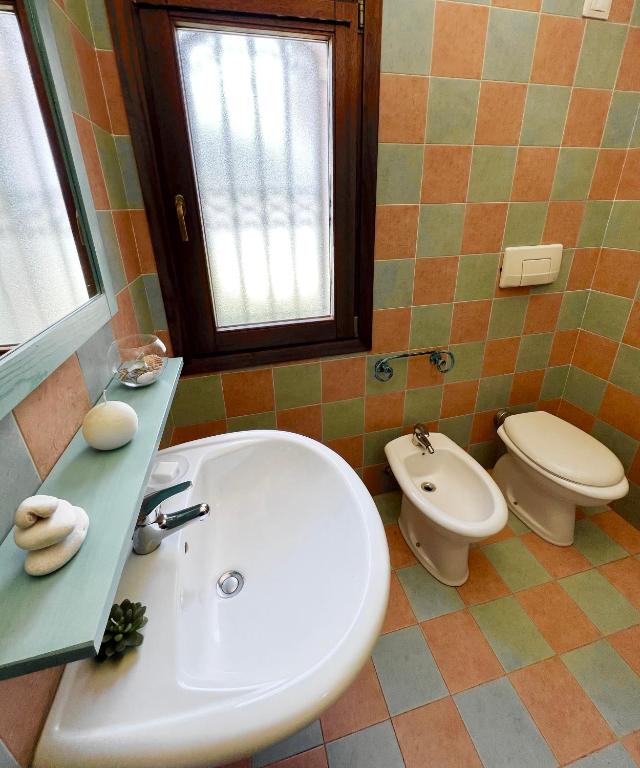 Łazienka w obiekcie Appartamento Le Ginestre