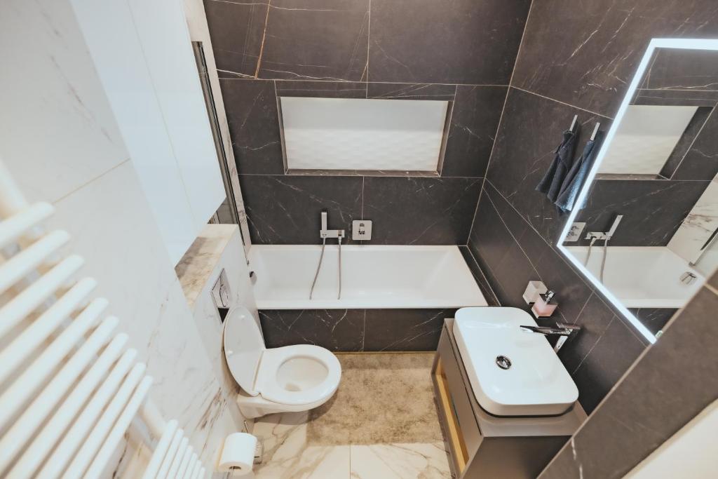 Kúpeľňa v ubytovaní Apartament Szlachecka