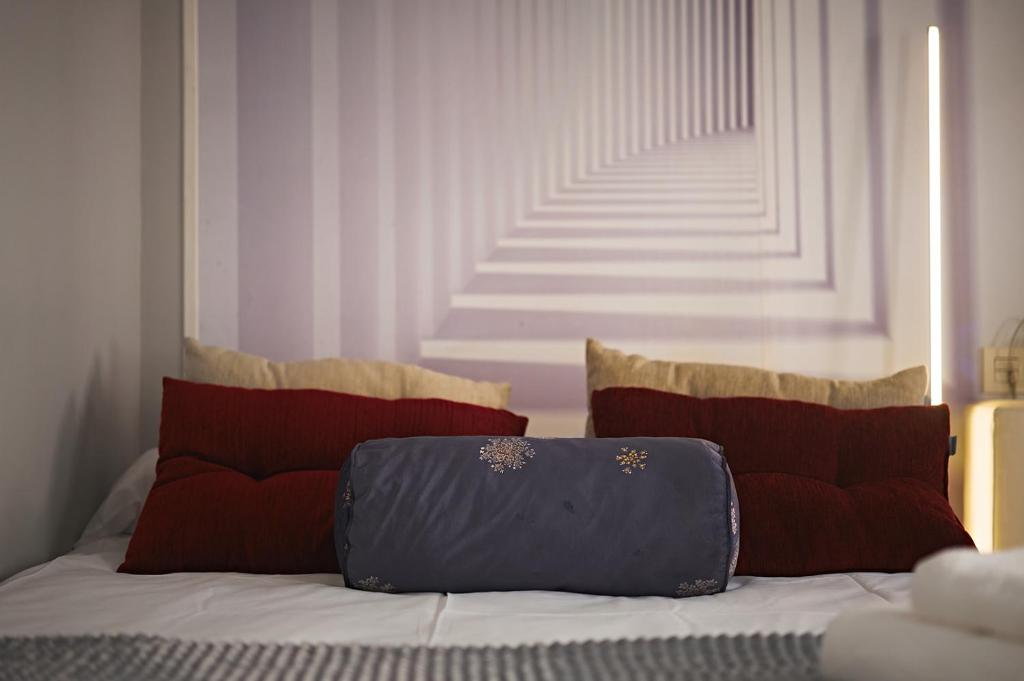 Posteľ alebo postele v izbe v ubytovaní Apartamentos Infantes 28