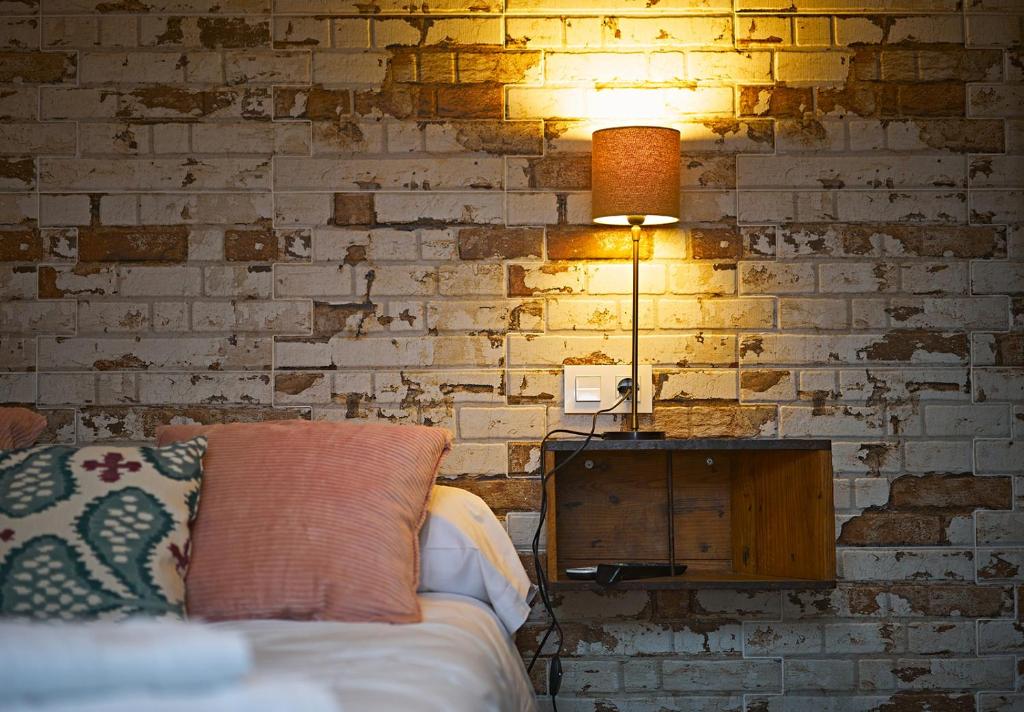 Posteľ alebo postele v izbe v ubytovaní Apartamentos Infantes 28