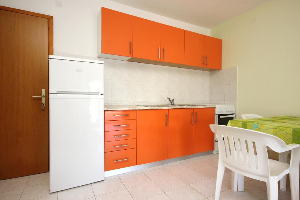Kuchyňa alebo kuchynka v ubytovaní Apartment Tri Zala 174b