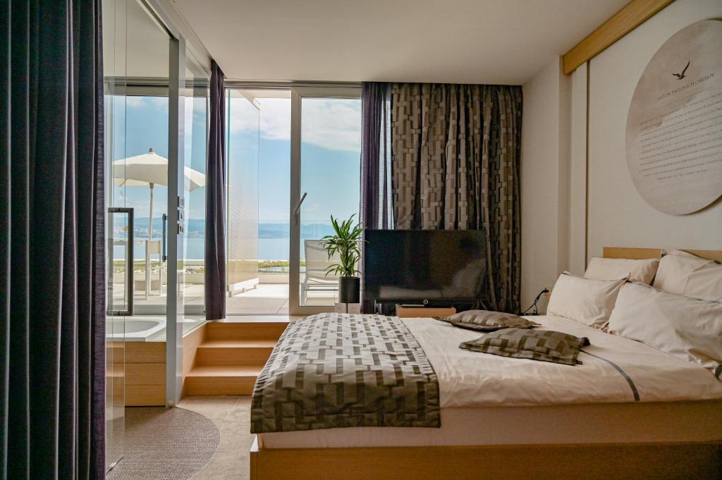 Postel nebo postele na pokoji v ubytování Bevanda Hotel & Restaurant - Unique Adriatic