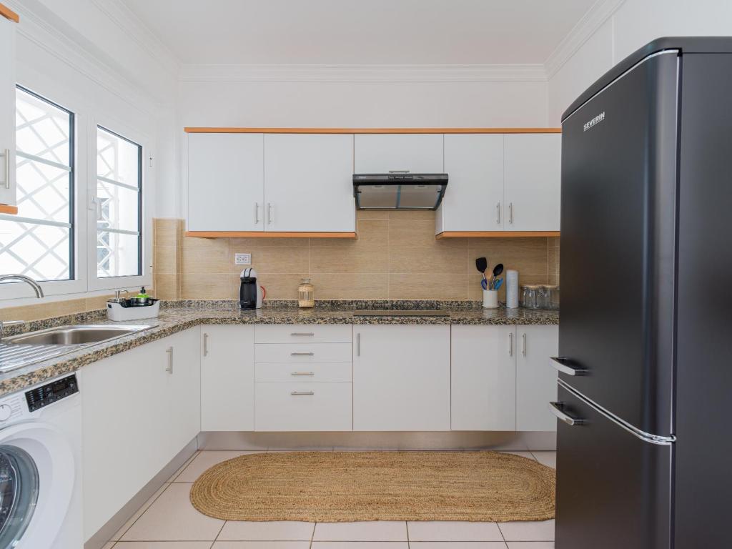 Kuchyňa alebo kuchynka v ubytovaní MoganSol Apartment