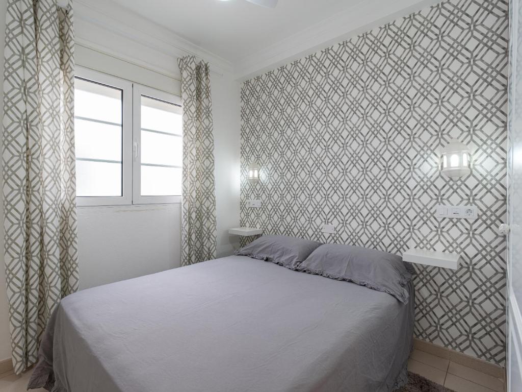 Posteľ alebo postele v izbe v ubytovaní MoganSol Apartment