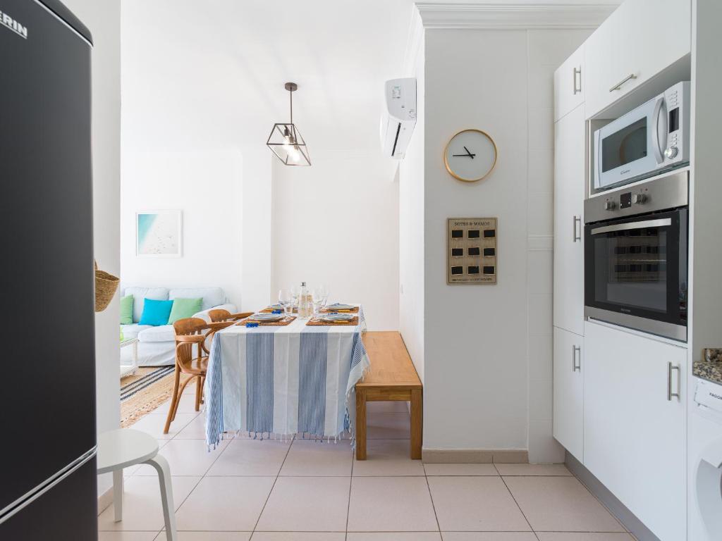 Kuchyňa alebo kuchynka v ubytovaní MoganSol Apartment
