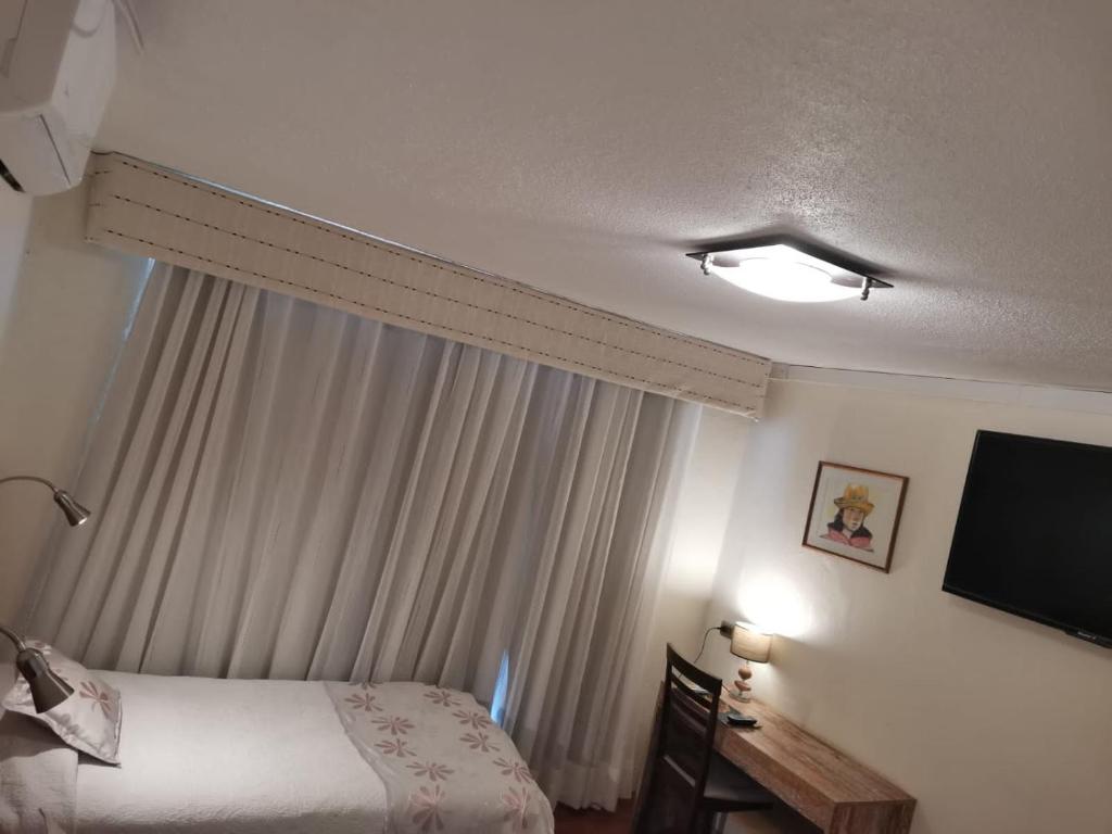 Postel nebo postele na pokoji v ubytování Atankalama
