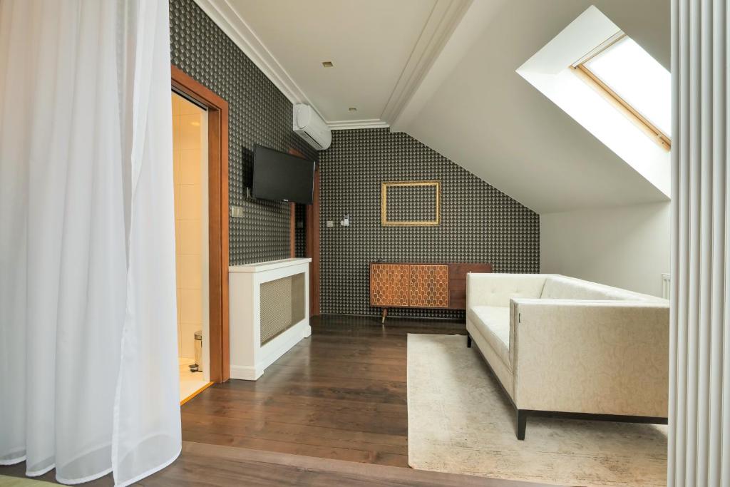 TV a/nebo společenská místnost v ubytování Hotel Zlatá Hvězda